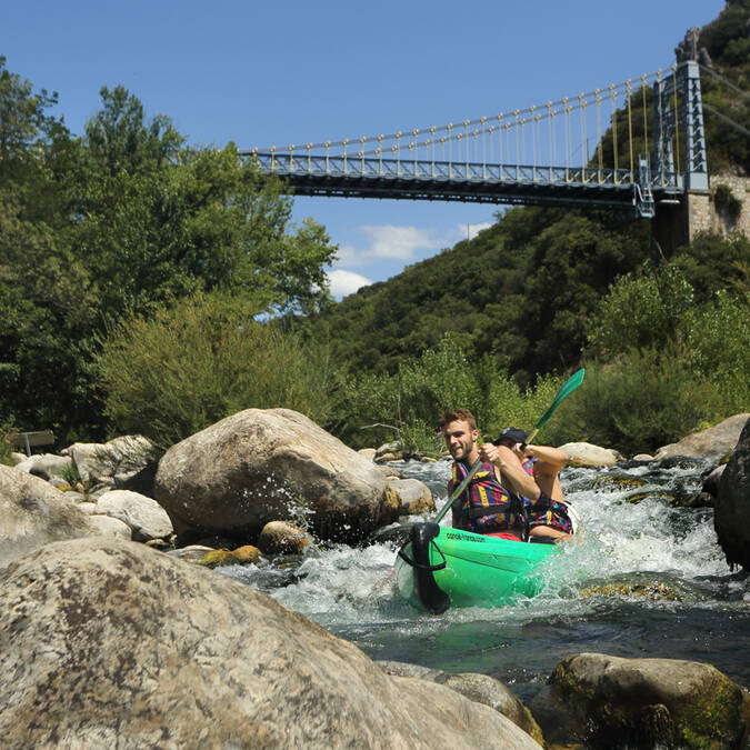 Canoe and suspension bridge